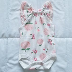 Peach bodysuit for baby girl